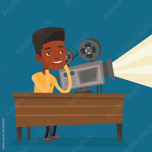 Caucasian projectionist showing new film.