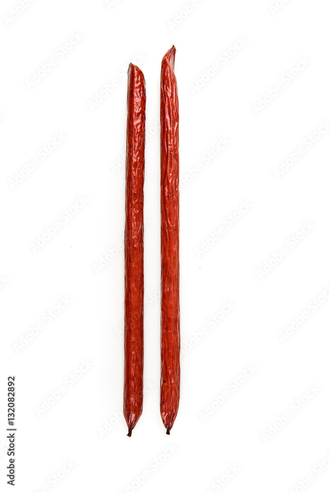 Pepperoni snack sticks isolated on a white background Pepperoni snack sticks isolated on a white background