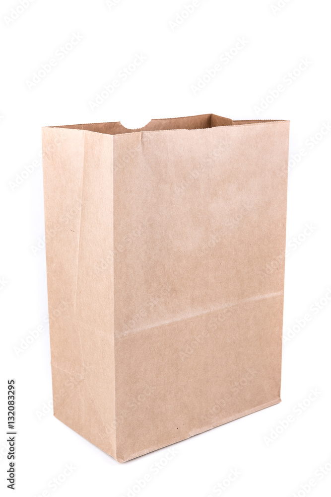 Plain brown paper shopping bag isolated on a white background