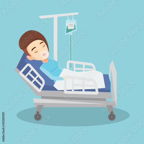Patient lying in hospital bed with oxygen mask.