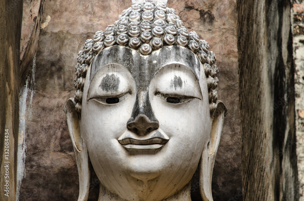 ancient old buddha in thailand , closed up on face ancient old buddha in thailand , closed up on face