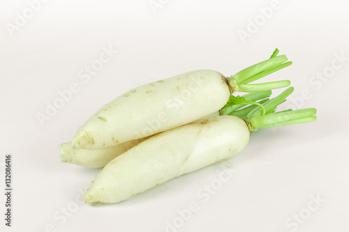 fresh slices white radish on wooden background, healthy vegatable