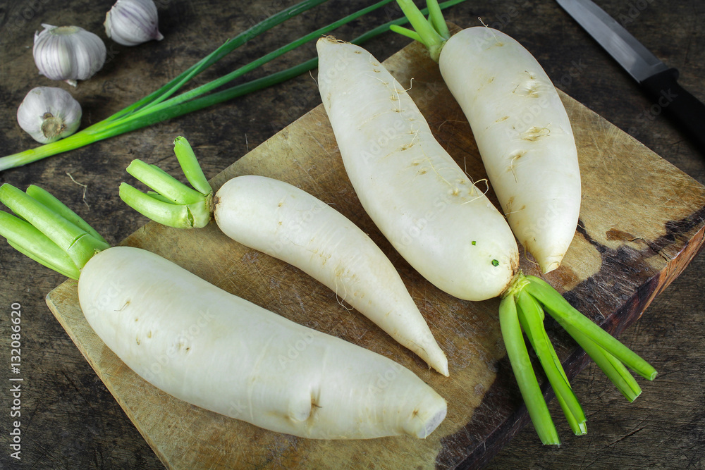 fresh slices white radish on wooden background, healthy vegatable fresh slices white radish on wooden background, healthy vegatable