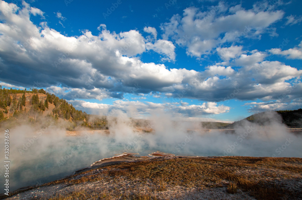 Excelsior Geyser in the Midway Geyser Basin next to the Firehole River in Yellowstone National Park in Wyoming USA