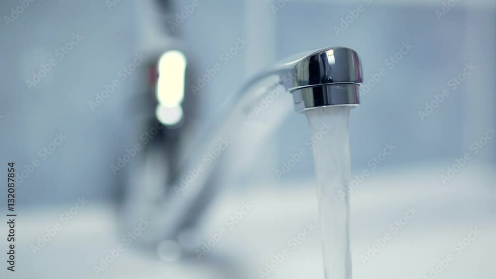 Silver faucet water drips dripping Silver faucet water drips dripping