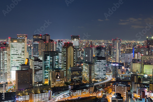 Osaka city downtown from Umeda Sky building at twilight, Japan © pranodhm