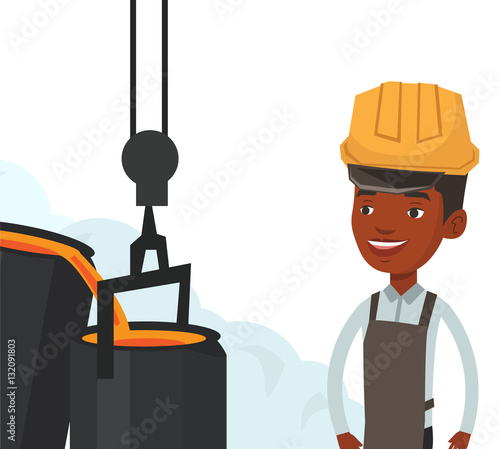 Steelworker in hardhat at work in the foundry.