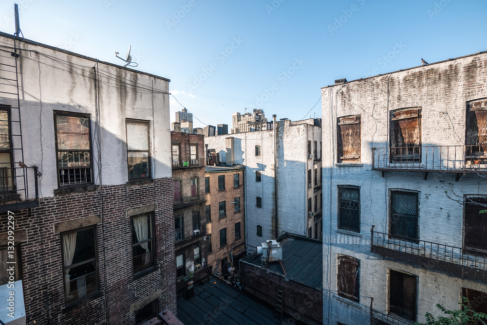 Brownstones and urban dwellings in between blocks in New York City