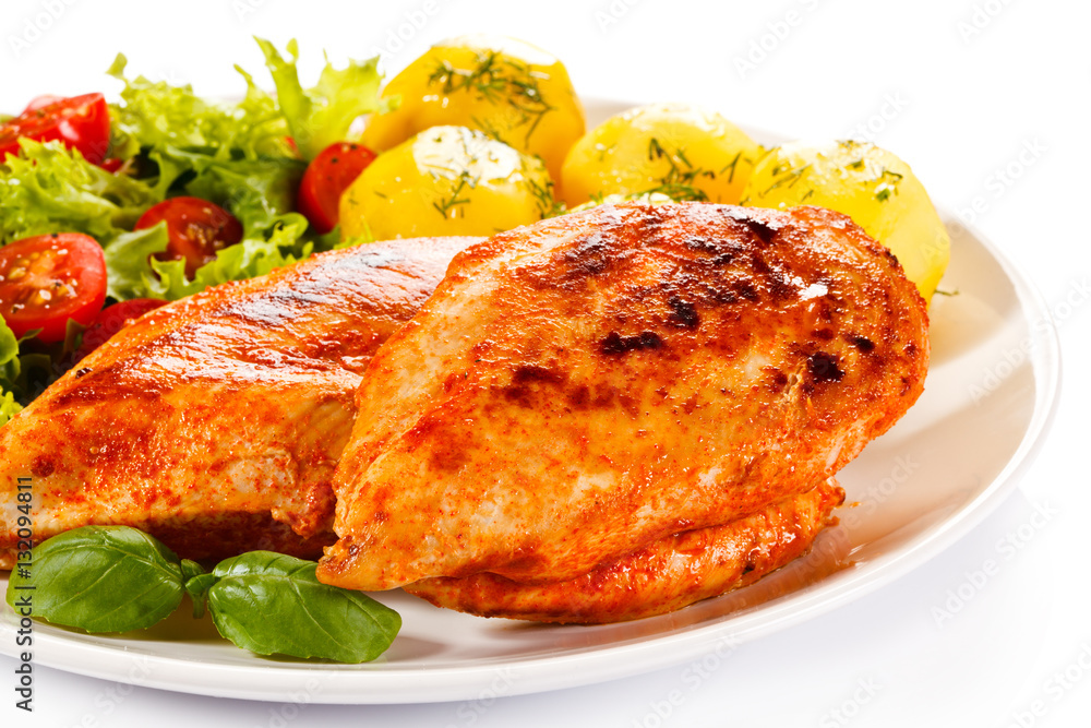 Roast chicken fillets, boiled potatoes and vegetable salad Roast chicken fillets, boiled potatoes and vegetable salad