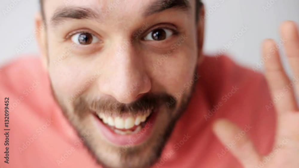 happy smiling man with beard having fun at camera