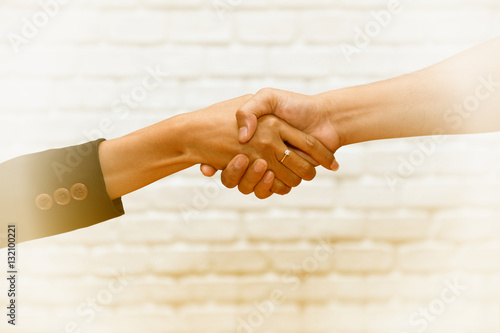 Handshake : Teamwork for success of the business in the future.