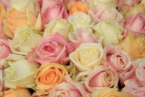 Pastel roses in a wedding arrangement