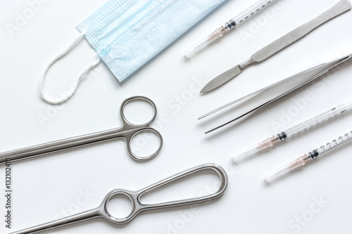 instruments for plastic surgery on white background