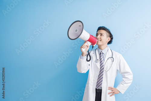 male doctor take microphone photo