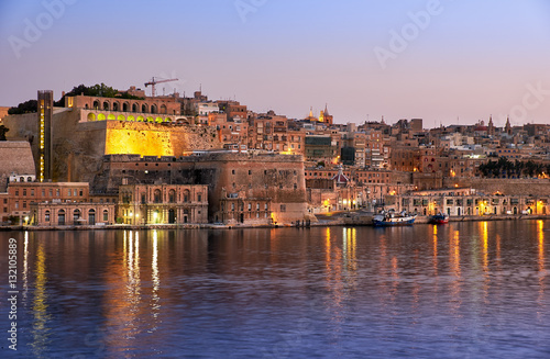The early morning view of Valletta fortifications from the water