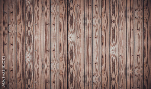 Wood grain texture with knots in dark brown color tone