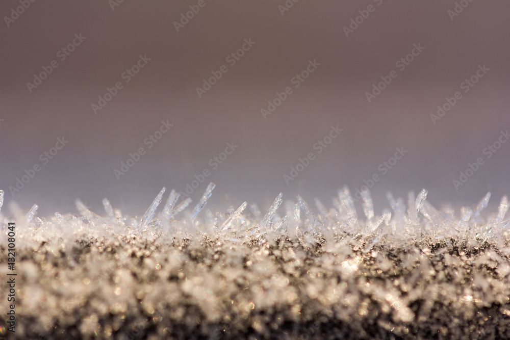 winter background with sparkling ice crystals with copy space, macro photos. shallow depth of field