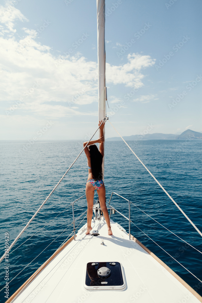 sexy woman relax on yacht in sea sexy woman relax on yacht in sea