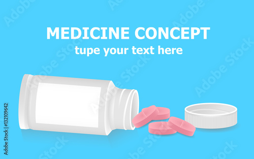 Pills poured from a bottle on a blue background. Medicine concept.