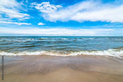 Blue sky and sea beach, landscape, coast with waves in the summer vacation, Poland, Baltic