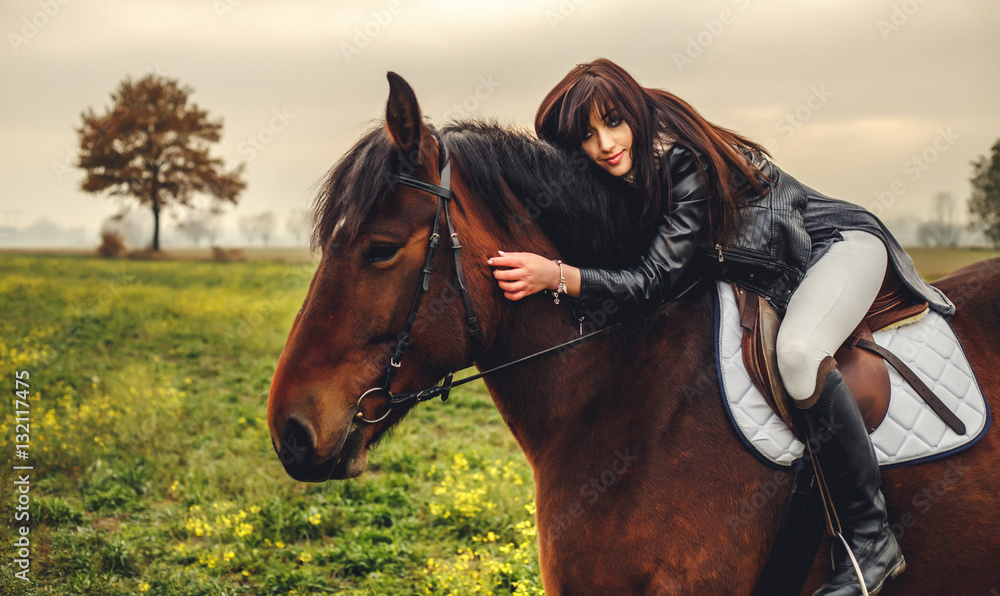 Beautiful girl riding a horse Beautiful girl riding a horse