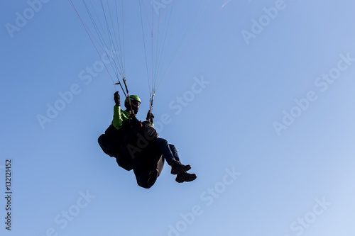 one paragliding in the sky