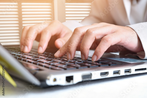 Data entry,Women key information into the computer.