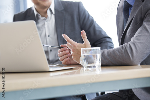 Business people talking in meeting room