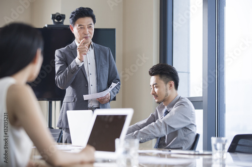 Business people talking in meeting room