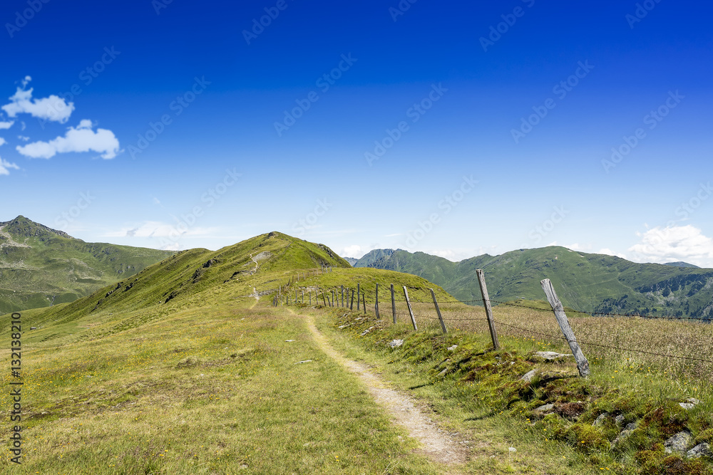 Winding footpath to top of alpine mountain