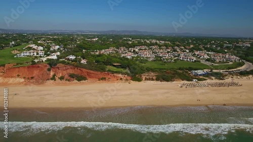 Aerial. Beach Garrao shores Vale de Lobo filmed from the sky.
