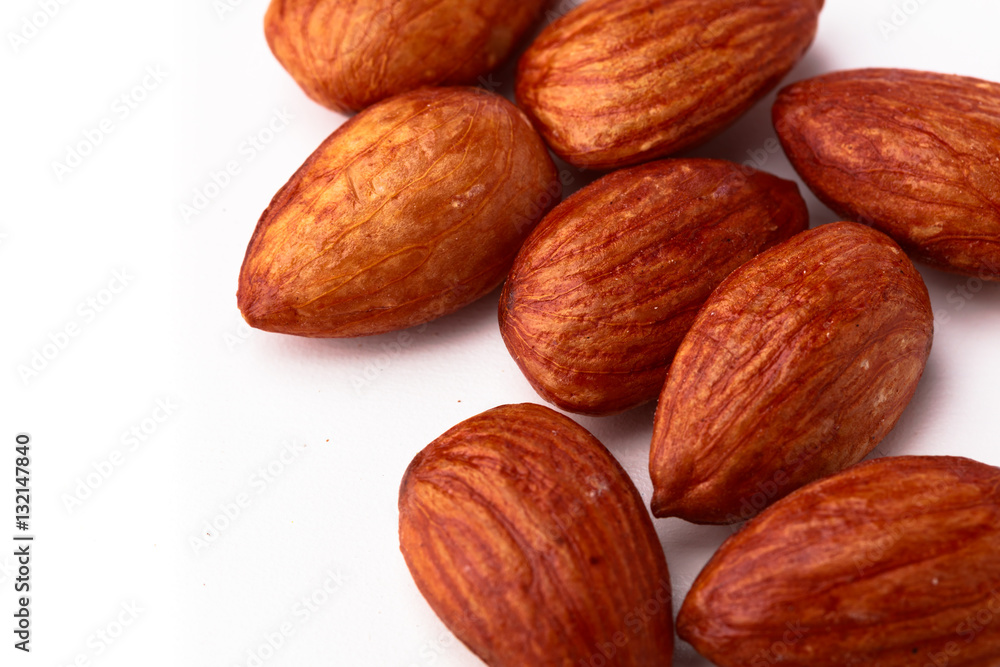 Closeup of multiple raw almond nuts Closeup of multiple raw almond nuts