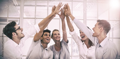 Bild auf Leinwand Group therapy in session sitting in a circle high fiving