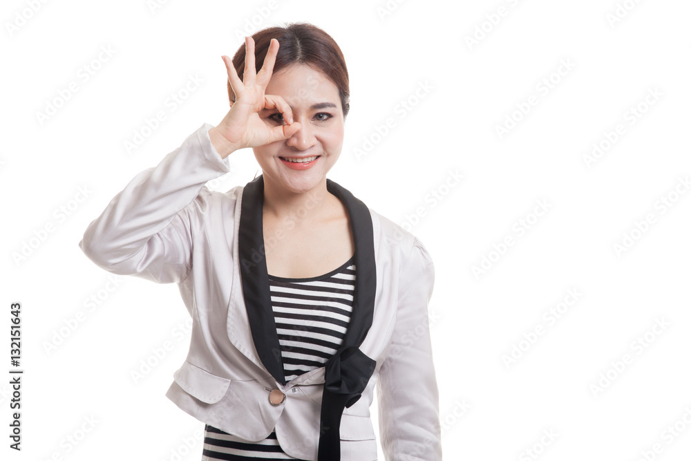 Beautiful young Asian woman show OK sign over her eye. Beautiful young Asian woman show OK sign over her eye.