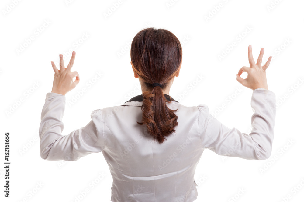 Back view of Asian business woman show double OK hand sign. Back view of Asian business woman show double OK hand sign.