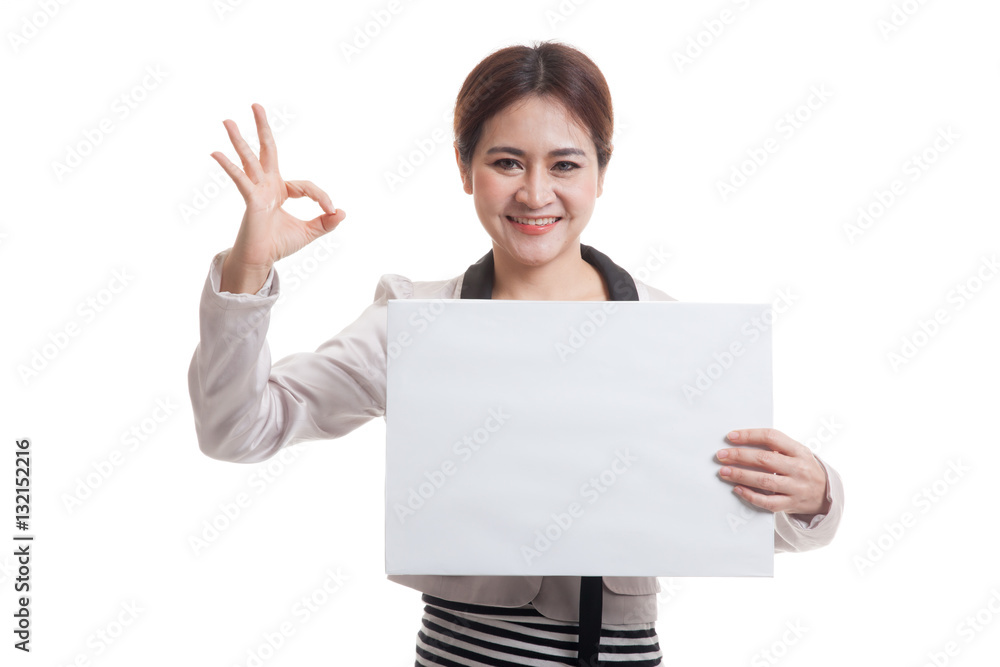 Young Asian business woman show OK with white blank sign. Young Asian business woman show OK with white blank sign.