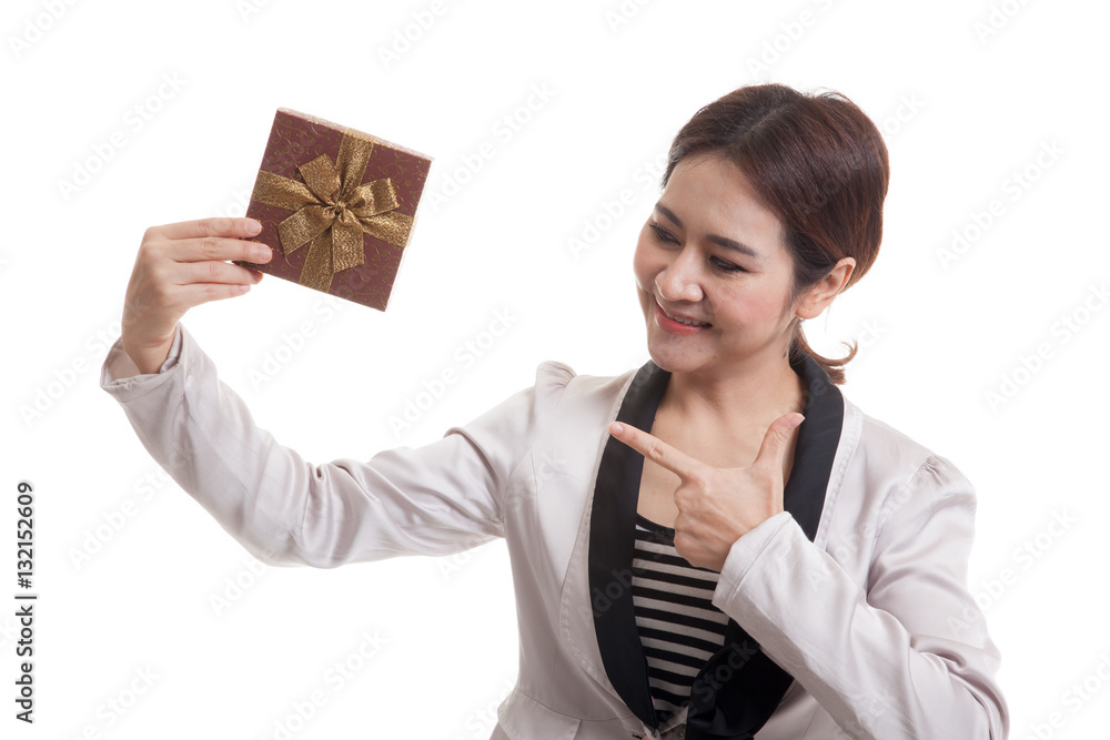 Young Asian business woman with a gift box. Young Asian business woman with a gift box.