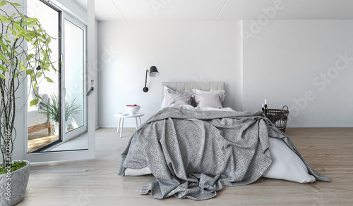 Modern bedroom interior with rumpled bedclothes
