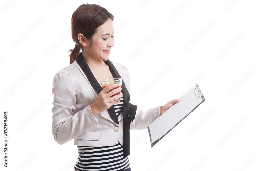 Asian business woman with clipboard and tomato juice. Asian business woman with clipboard and tomato juice.