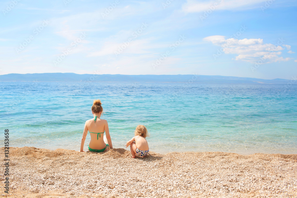 mother and son on beach