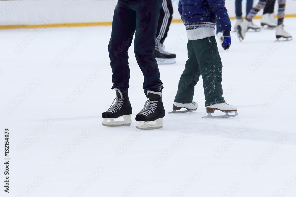 Fototapeta premium people skating on the ice rink