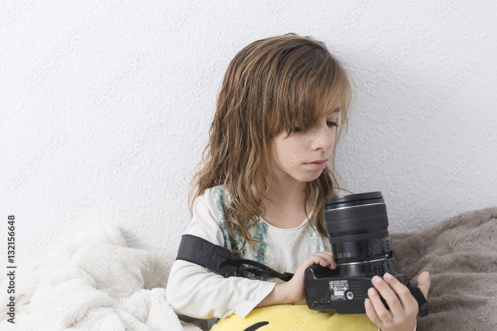 Girl with a camera in her hands. Girl with a camera in her hands.
