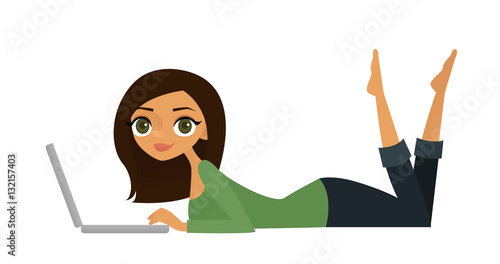 Young woman lying down while using a laptop computer