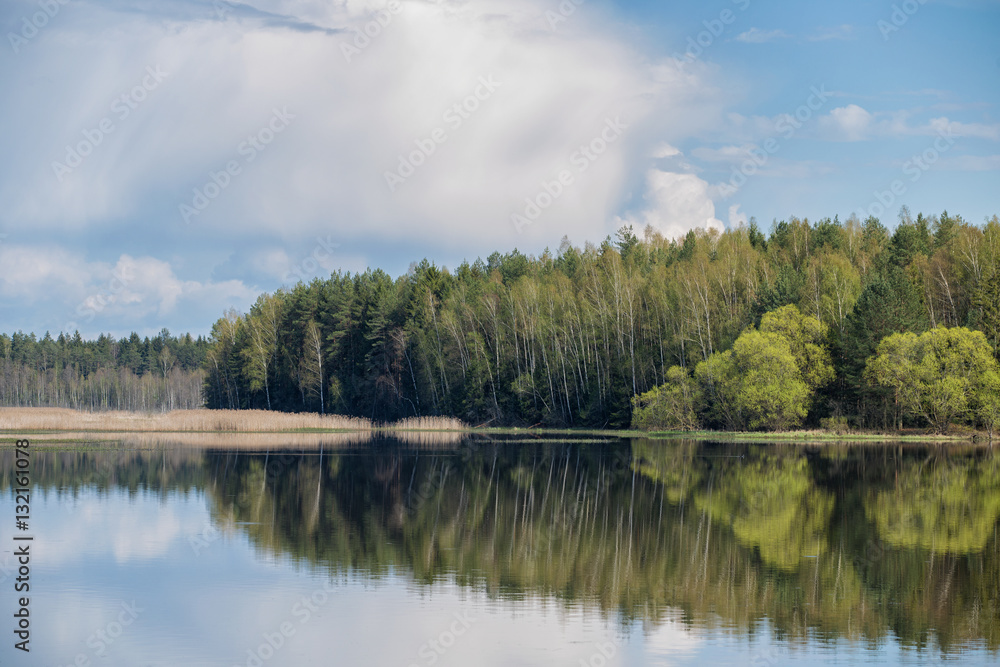 Landscape of sky with clouds pond Beautiful white billowing  against a blue .