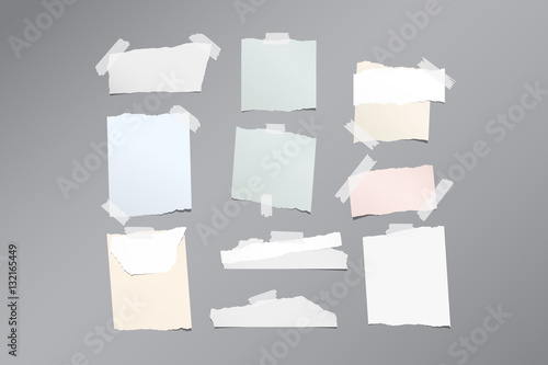 Pieces of different size ripped note, notebook, copybook paper sheets stuck with sticky tape on gray pattern