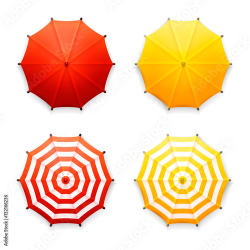 isolated red and yellow beach umbrellas, top view