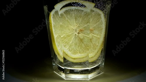Making cocktails at the bar. Close up of preparation of alcoholic cocktail in a glass. Evening rest and relaxation indoors. Barman prepares tasty drinking