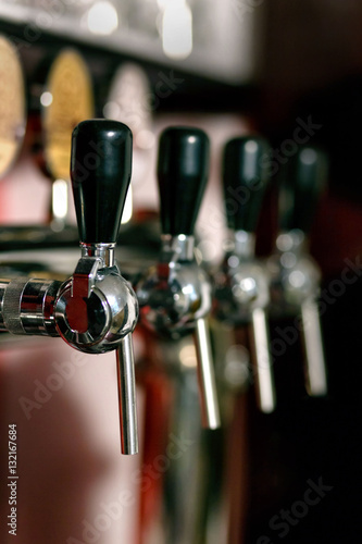 Barkeeper pulling a pint of beer