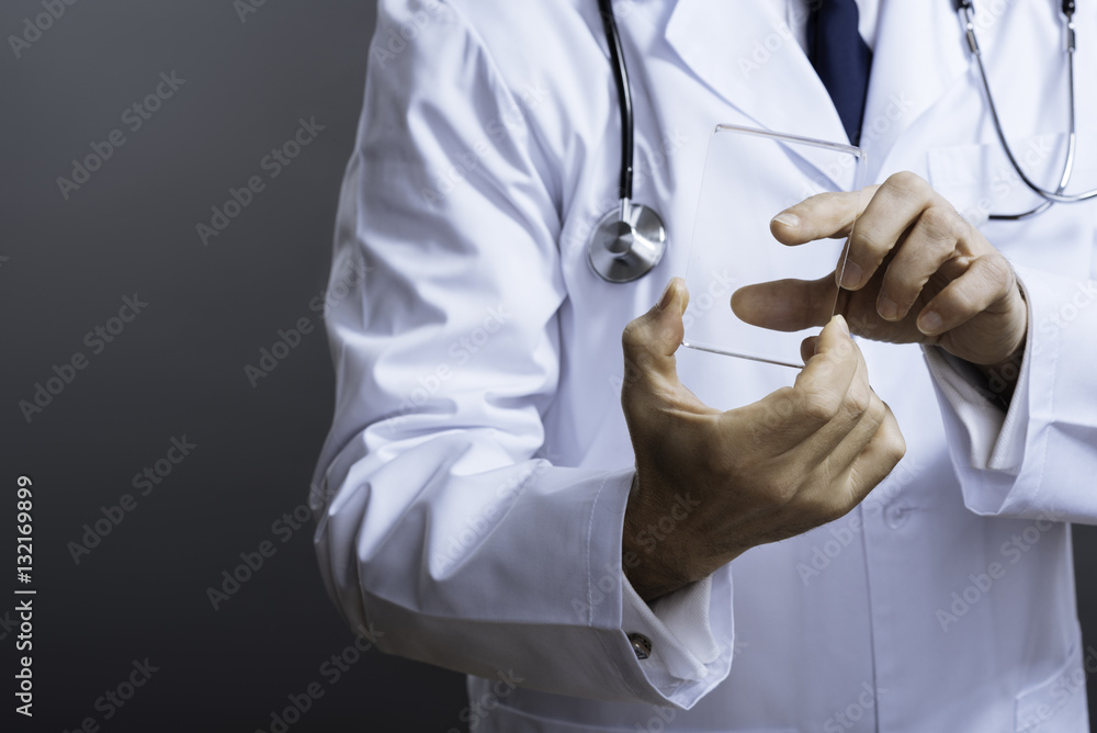 Close up of smart doctors hands holding special glass equipment Close up of smart doctors hands holding special glass equipment