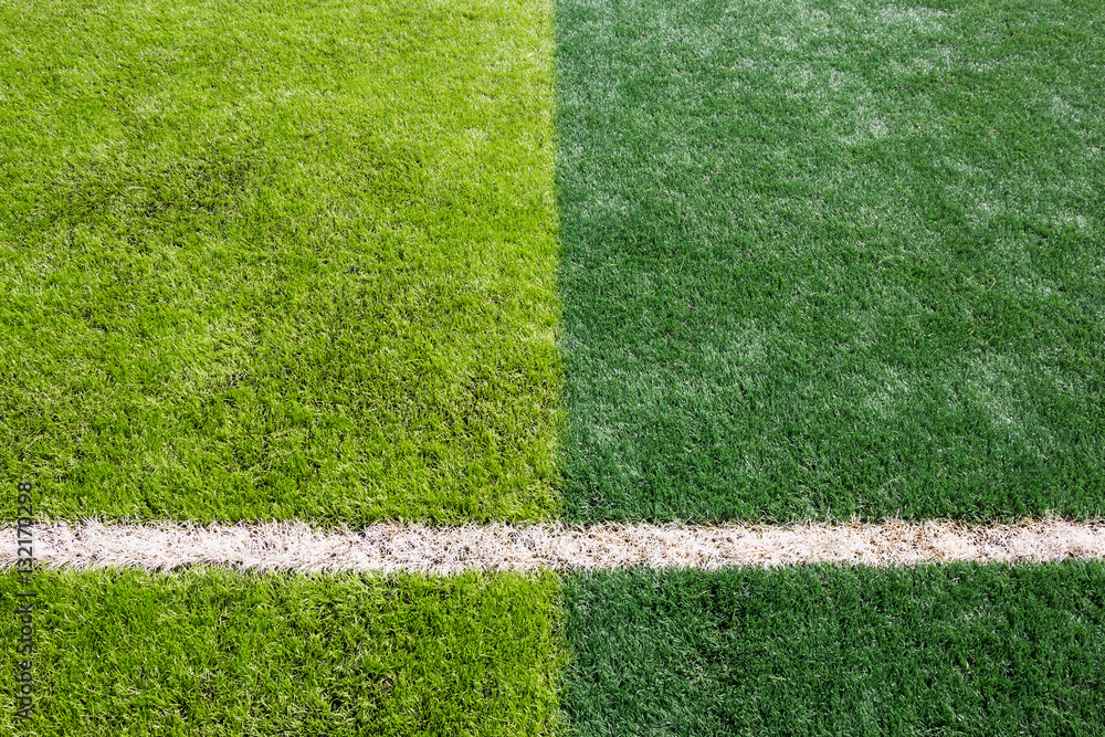 Fototapeta premium Green grass texture in soccer Field